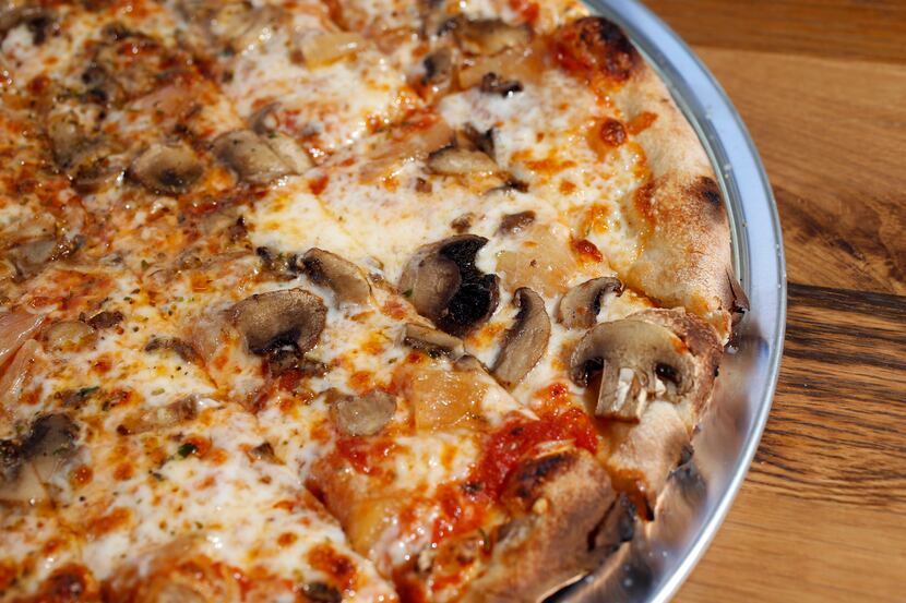 The Lower Greenville Community pizza at Flatbread Company is a vegetarian pizza topped with...