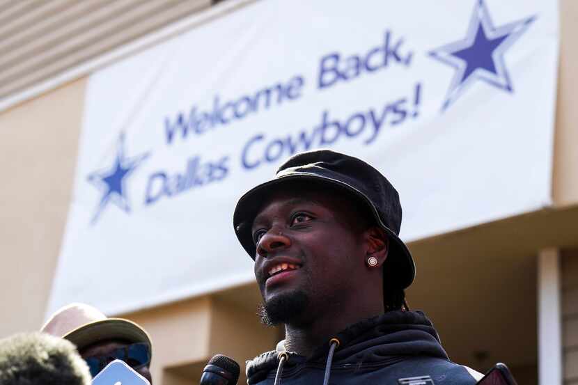 Dallas Cowboys wide receiver Michael Gallup talks to reporters as the team arrives for...