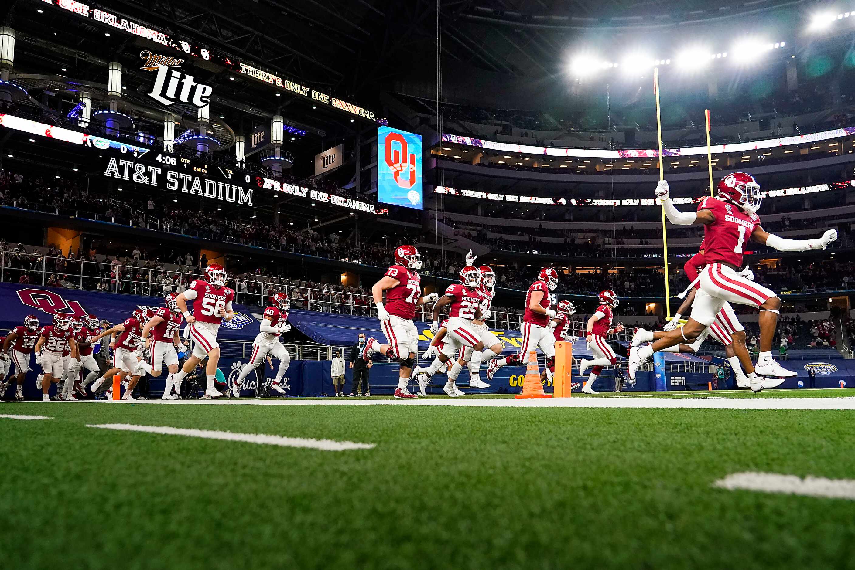Oklahoma players take the field for the Cotton Bowl Classic against Florida at AT&T Stadium...