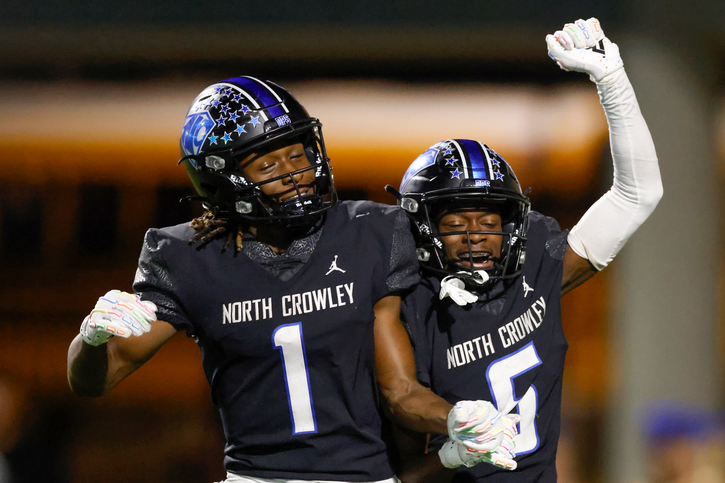 North Crowley wide receiver Quentin Gibson (6) celebrates his touchdown with North Crowley...