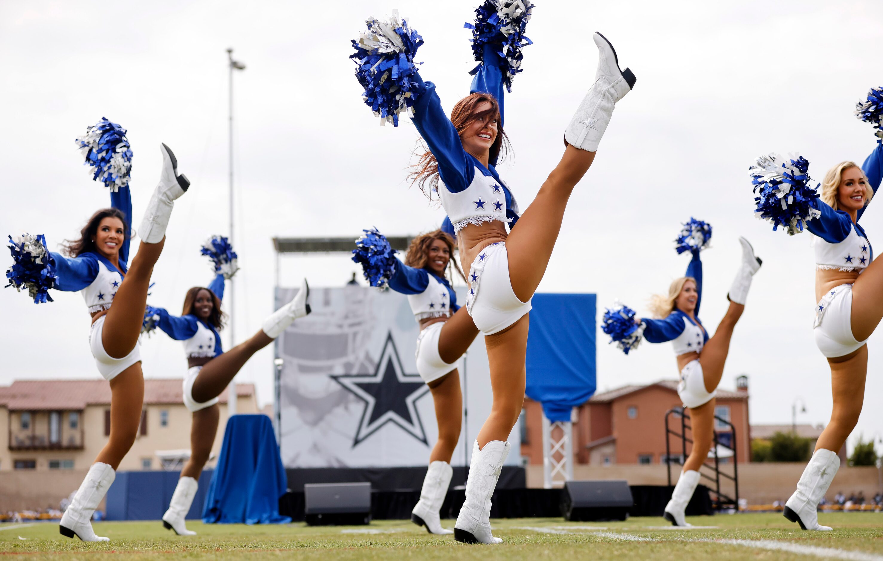 The Dallas Cowboys Cheerleaders perform during the Cowboys training camp opening ceremonies...