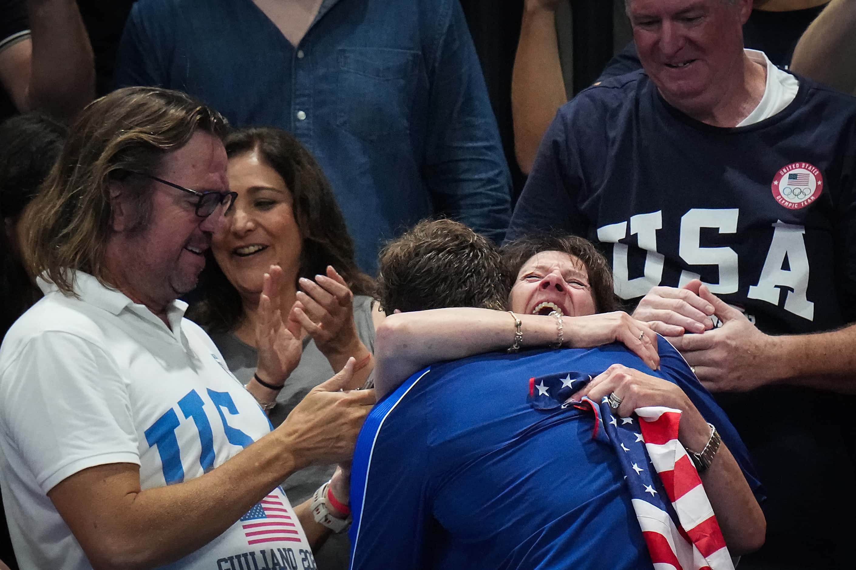 Chris Guiliano of the United States celebrates with his family after winning the gold medal...