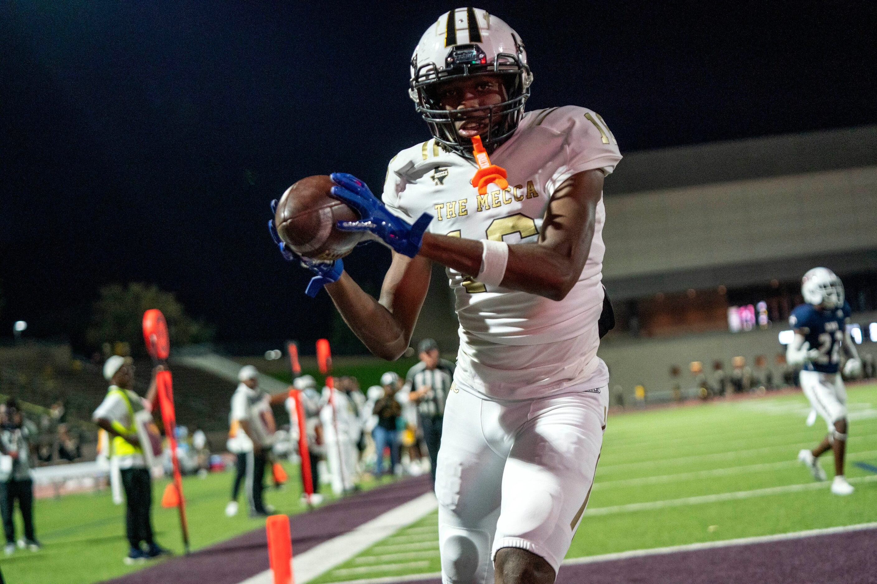 South Oak Cliff junior wide receiver Trey Jackson (16) hauls in a touchdown pass during the...