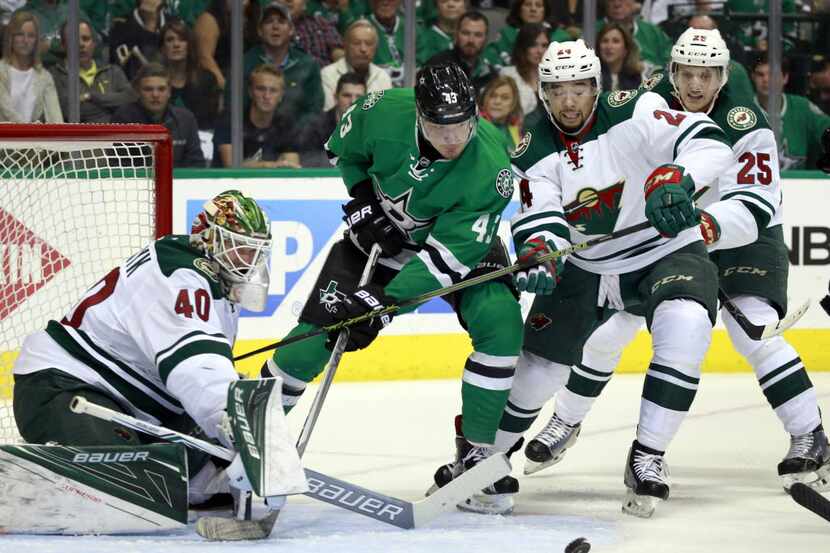 The puck rebounds away after Dallas Stars right wing Valeri Nichushkin (43) attempted a shot...