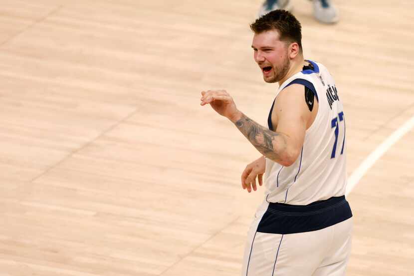 Dallas Mavericks guard Luka Doncic (77) waves bye towards the stands after game 6 of an NBA...