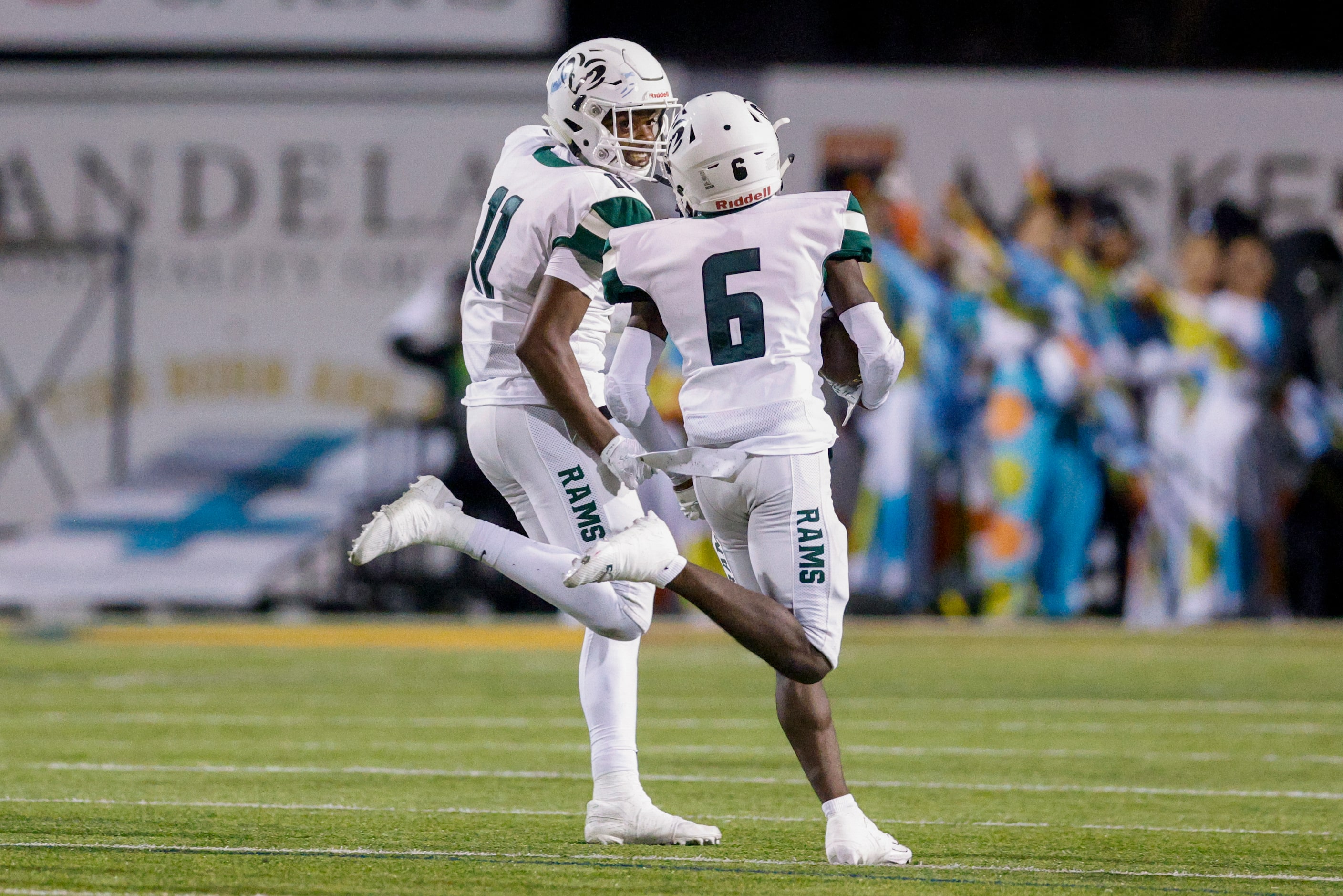 Richardson Berkner wide receiver Landon Polk (11) celebrates as wide receiver Dameon Crowe...