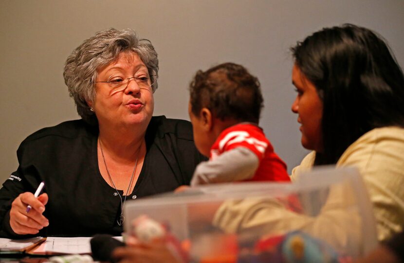 Suzanne Borman (left), a registered nurse with the WiNGS and Nurse-Family Partnership...