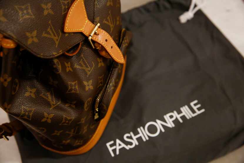 A Louis Vuitton handbag at Fashionphile inside Neiman Marcus at North Park Center sells...