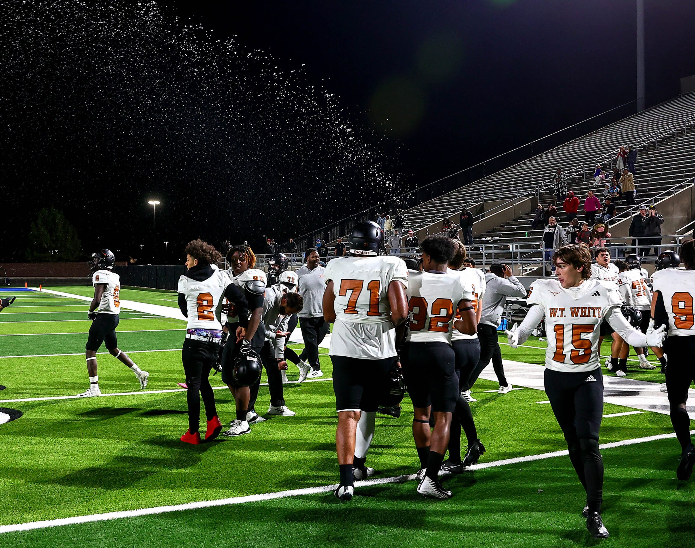 W.T. White Longhorns celebrate their victory over Birdville, 38-35 in overtime in a District...