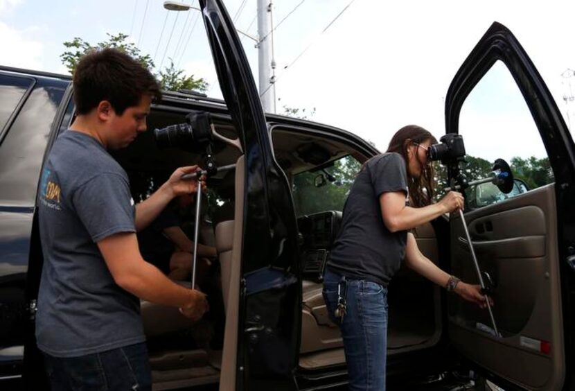 
Anthony Najera and Natalie Drew secure cameras before shooting a video aimed at helping...