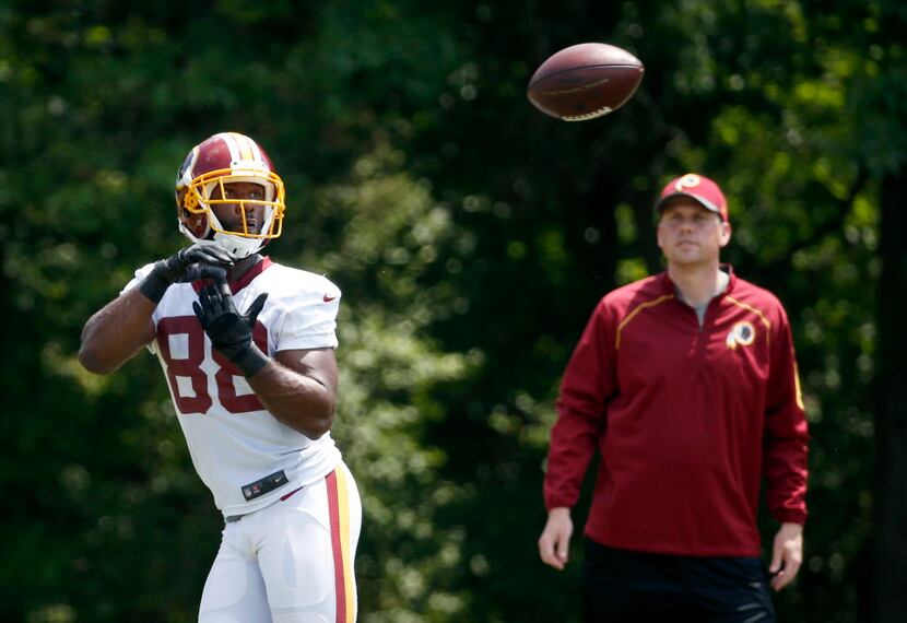 Washington Redskins wide receiver Pierre Garcon (88) catches the ball during practice at the...