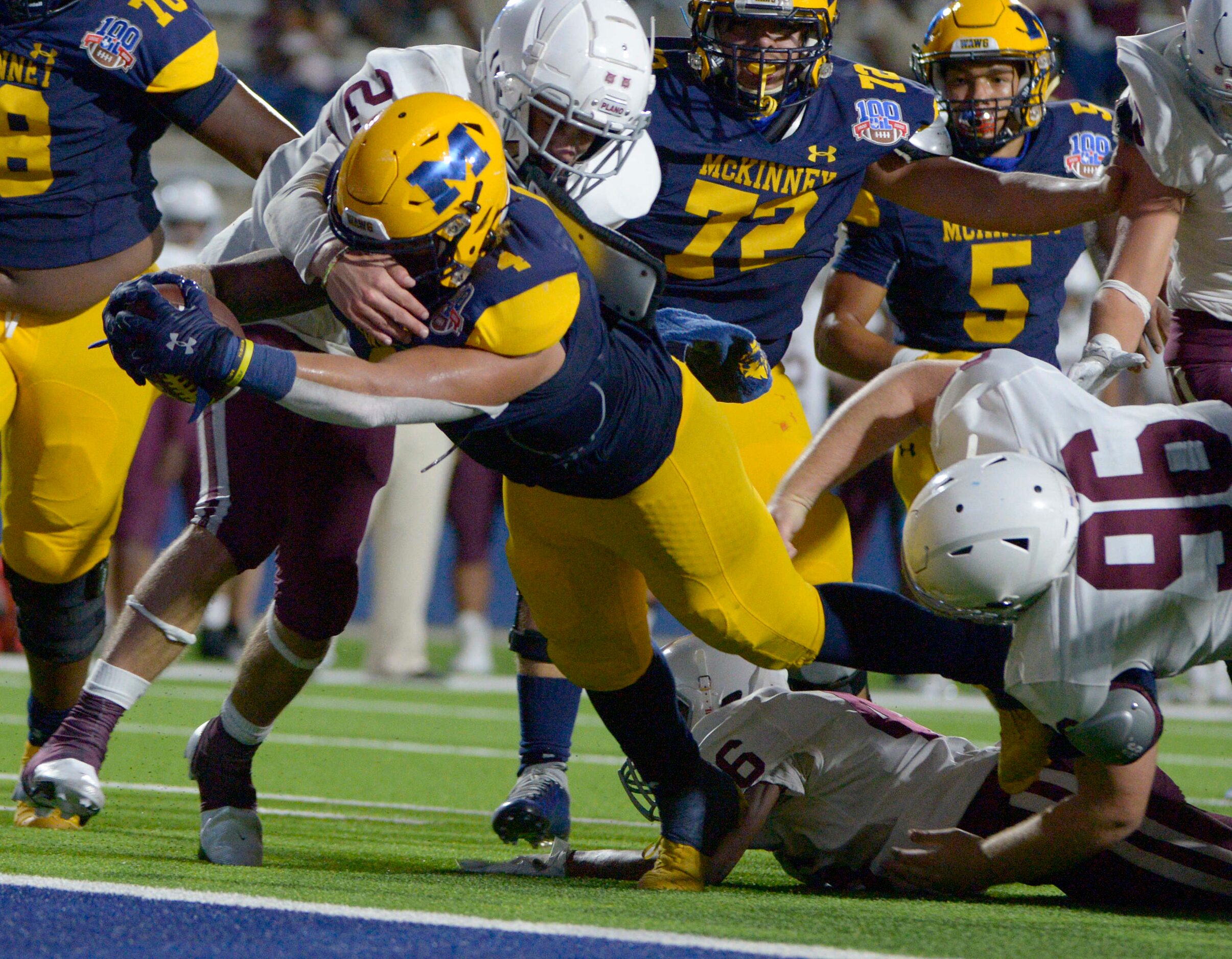 McKinneyÕs Joshua Dixon reaches across the goal line for a touchdown in the second quarter...