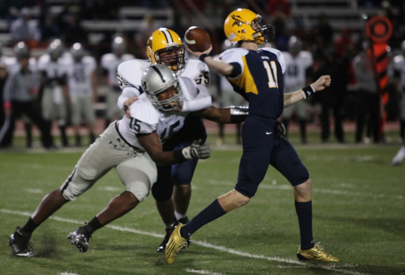 Arlington Martin junior defensive lineman Myles Garrett (15) runs passed Arlington Lamar...