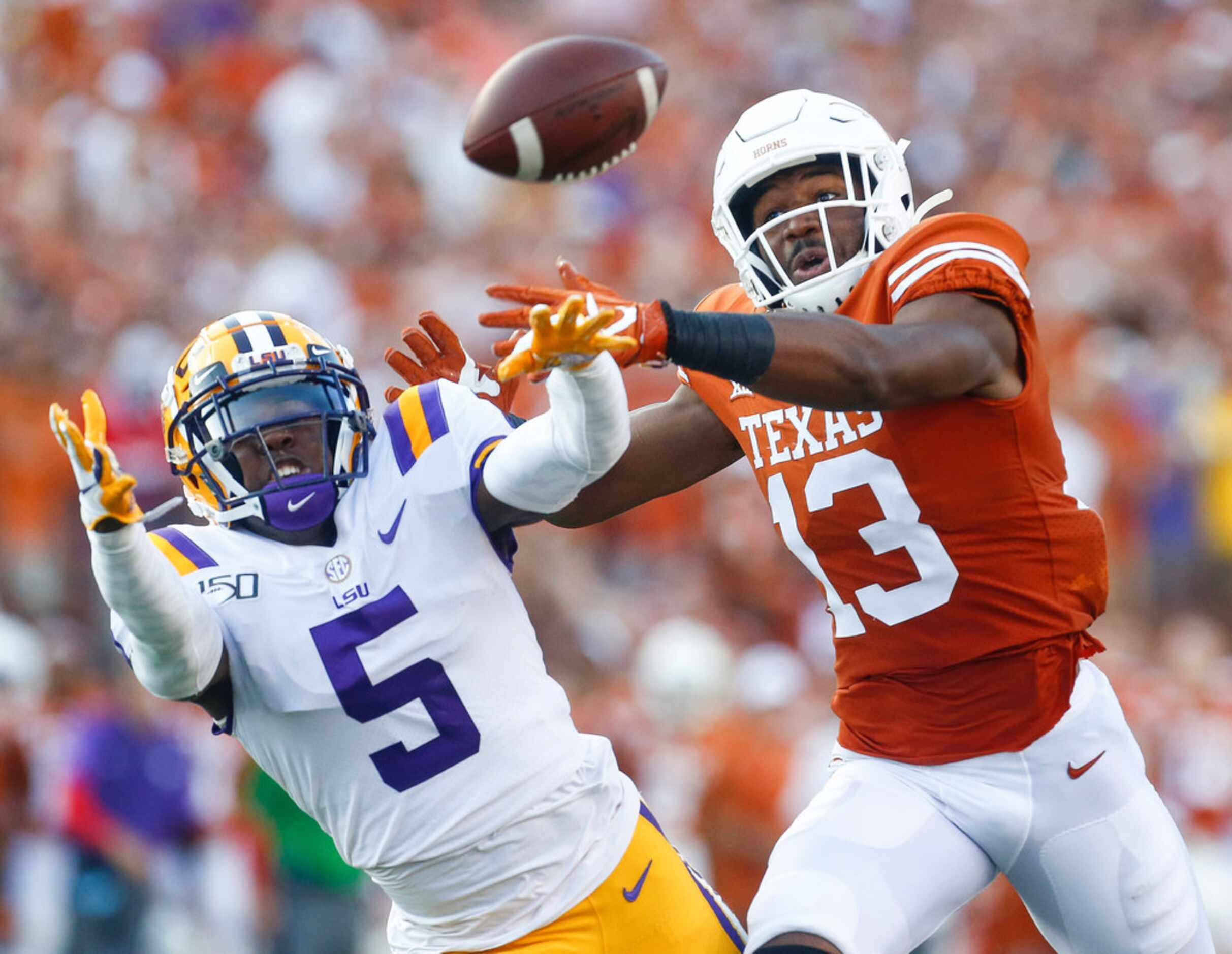 LSU Tigers cornerback Kary Vincent Jr. (5) breaks up a pass intended for Texas Longhorns...