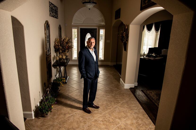 Ron Hernandez poses a photograph in his Dallas home on Friday, Feb. 8, 2019. Shortly after...