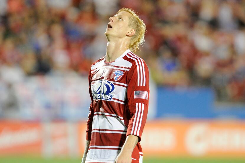 FC Dallas midfielder Brek Shea (20) reacts after a missed scoring opportunity in the first...