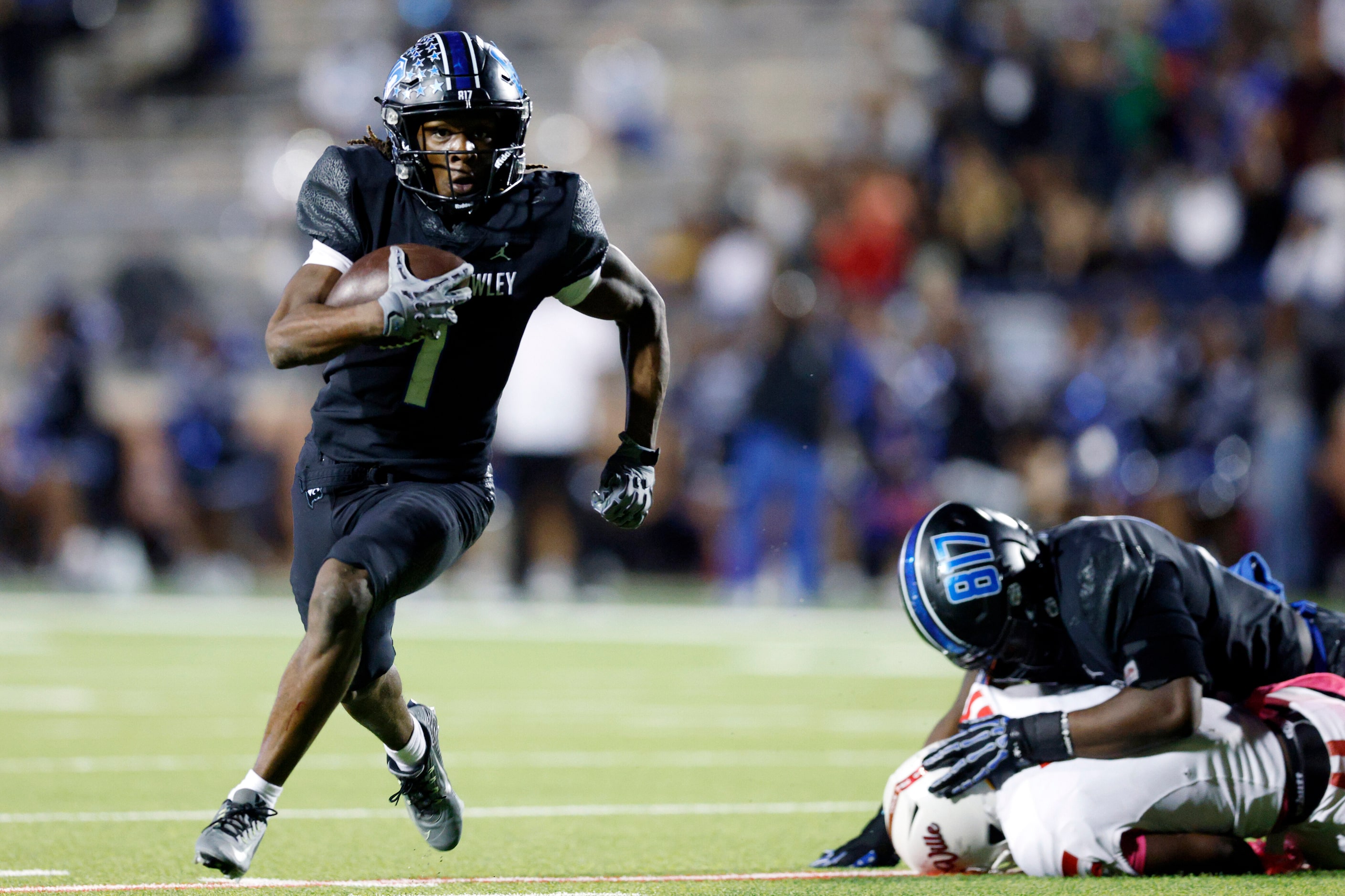 North Crowley running back Cornelius Warren (1) runs the ball up field during the second...