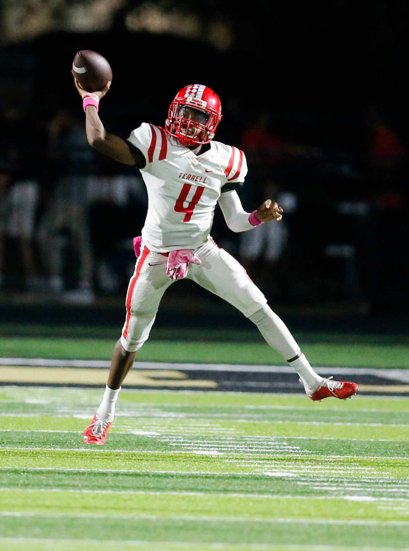 Terrell sophomore quarterback Lindon Henderson (4) throws during the first half of a high...