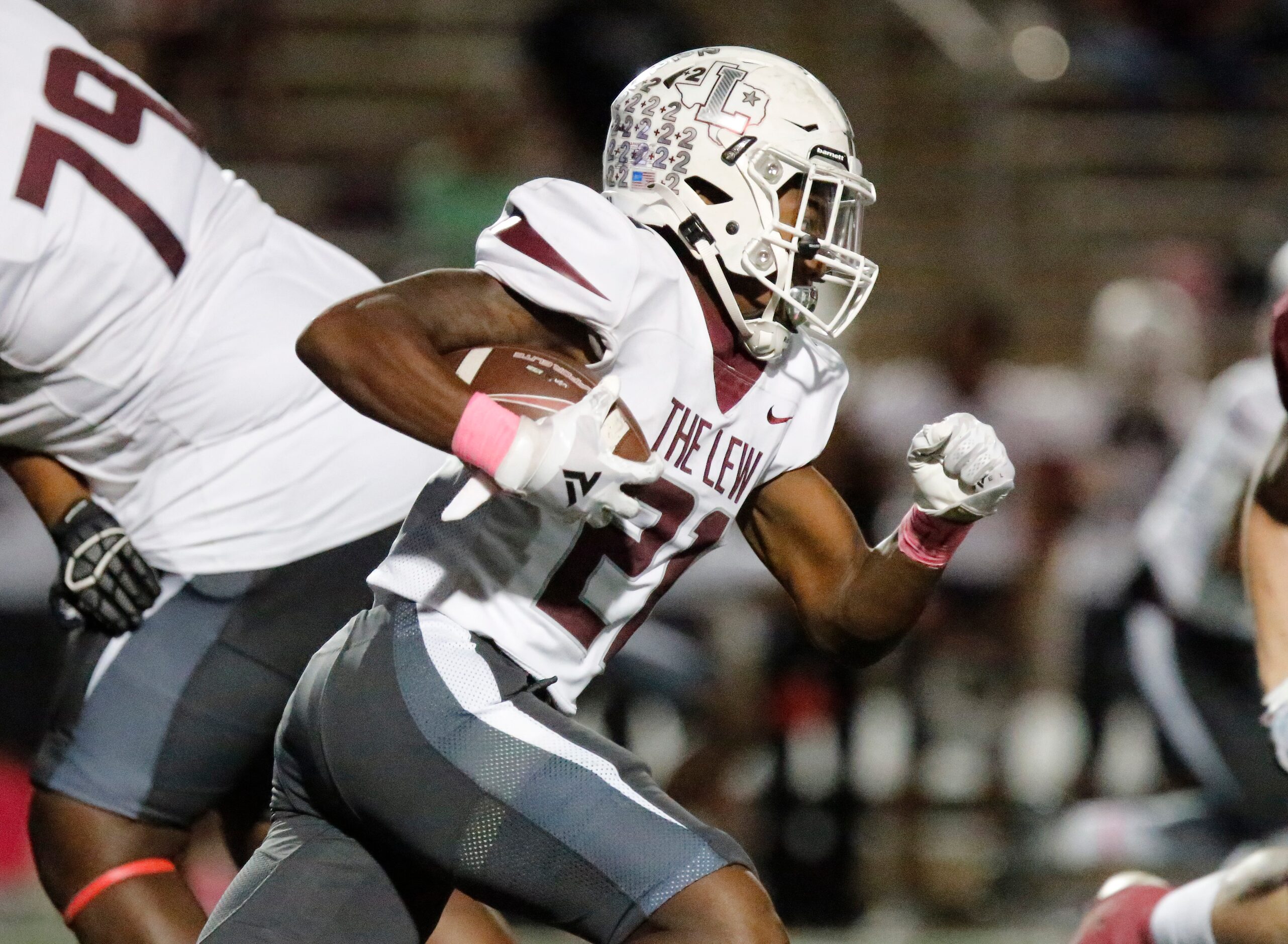 Lewisville High School running back Viron Ellison (21) carries the football during the first...