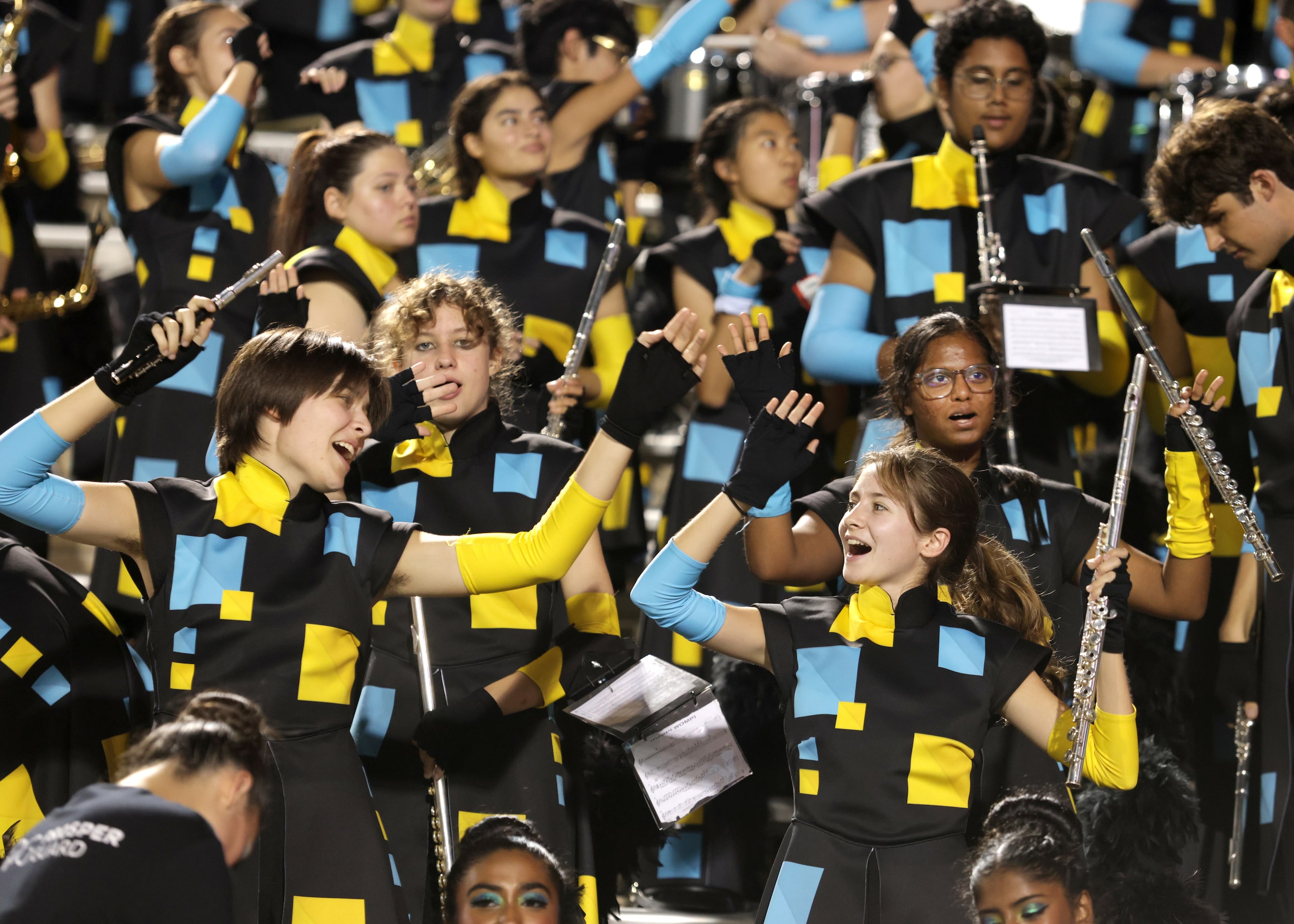 The Prosper band sings along to Neil Diamond during the Prosper High School at Allen High...