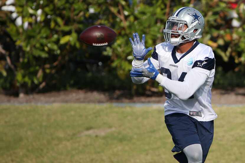 Dallas Cowboys running back Darius Jackson (34) catches the ball during team practice at The...