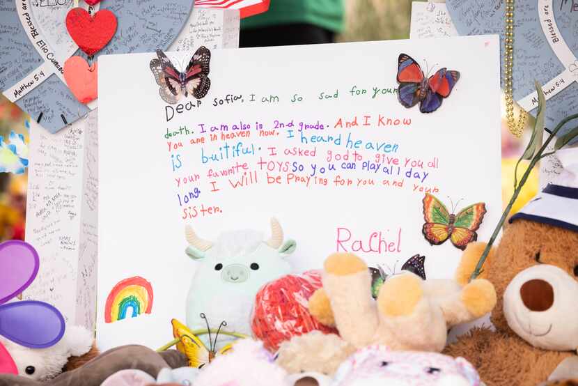 A letter left for Sofia Mendoza at a memorial set up honoring the victims of a mass shooting...