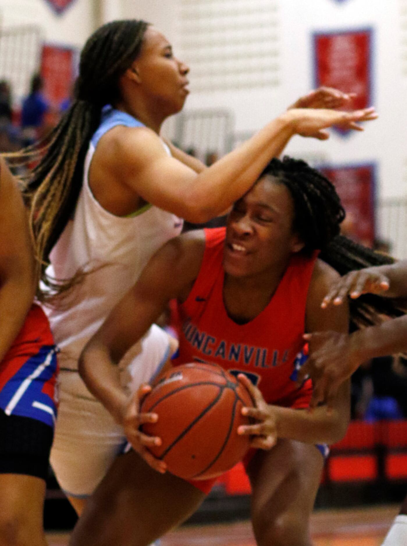 Duncanville's Anaya Bernaro (20) is fouled by Dallas Skyline's Francesca Jennings (24) while...