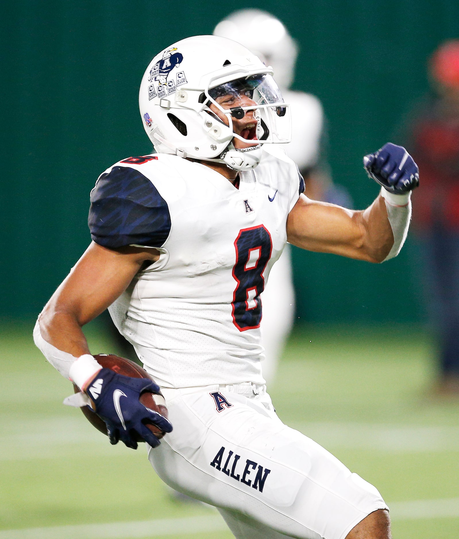 Allen senior wide receiver Blaine Green (8) celebrates scoring a touchdown during the first...