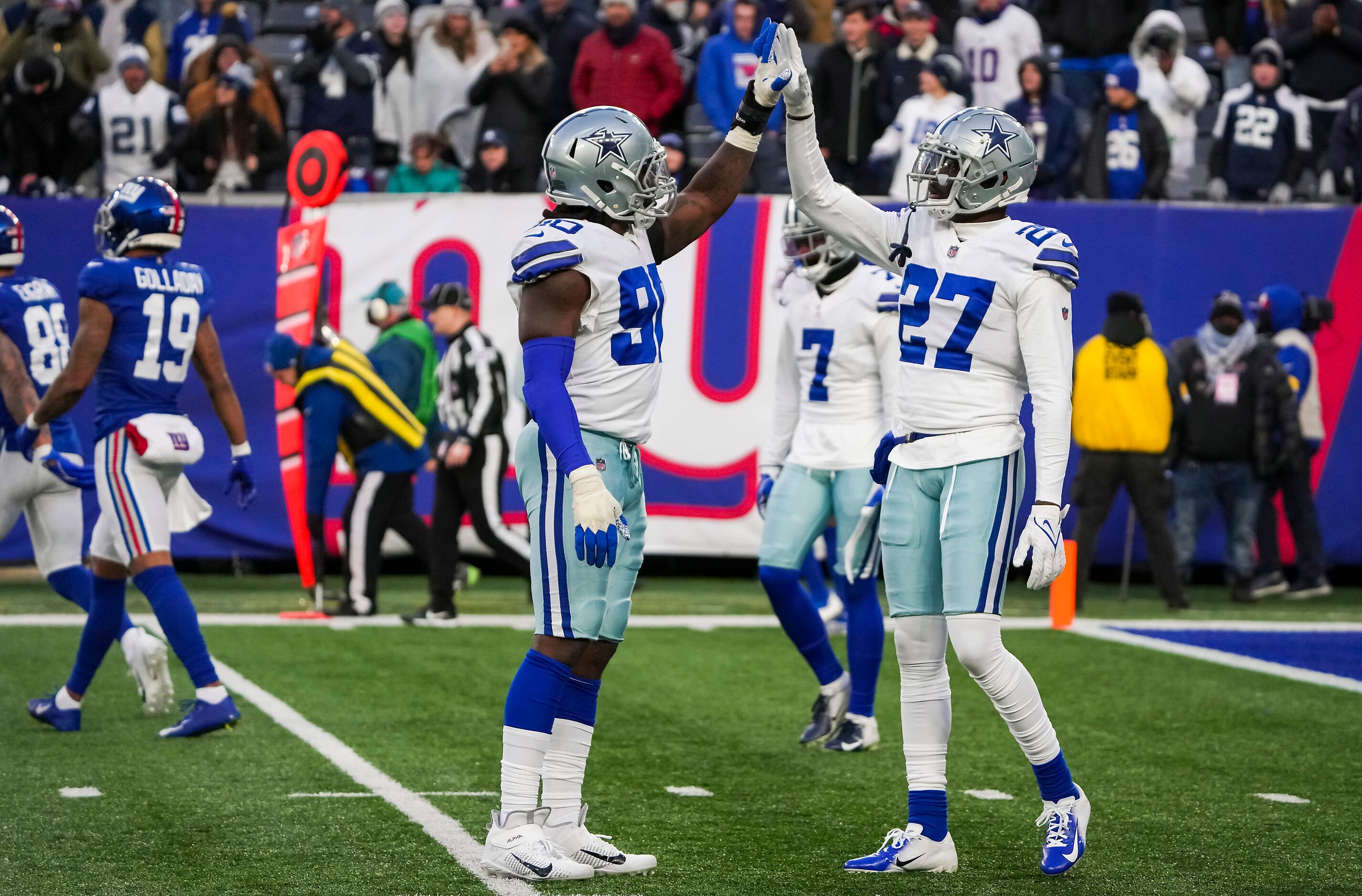 Dallas Cowboys safety Jayron Kearse (27) celebrates with defensive end Demarcus Lawrence...