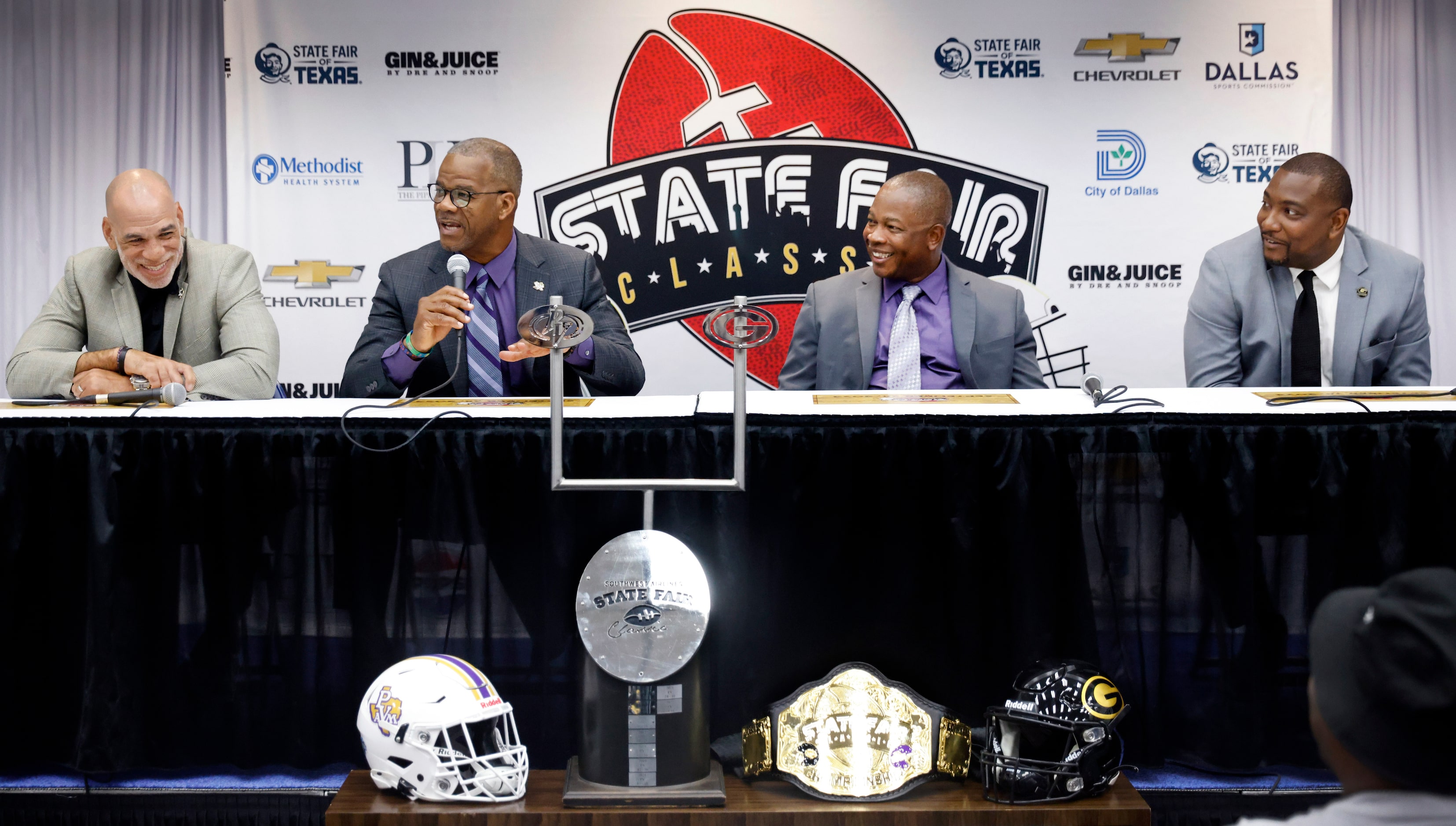 (from left) Prairie View A&M University Director of Athletics Anton Goff and his head...