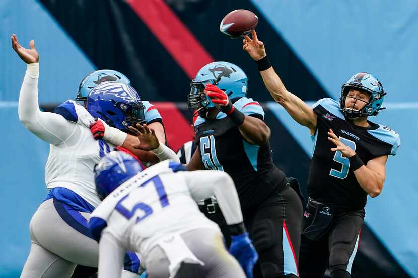 Dallas Renegades quarterback Philip Nelson (9) throws a pass during the first half of an XFL...