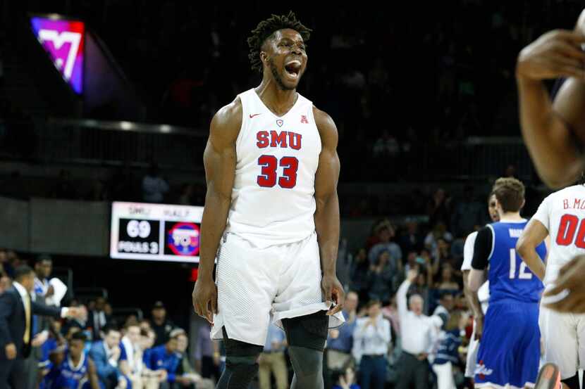 Southern Methodist Mustangs forward Semi Ojeleye (33) screams after an alley-ooo during the...