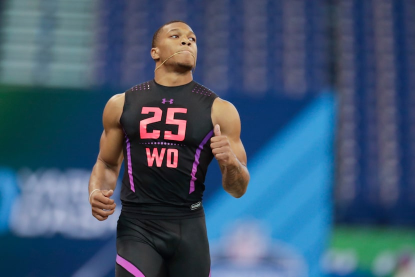 Maryland wide receiver D J Moore runs the 40-yard dash at the NFL football scouting combine...