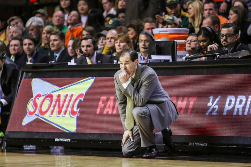 Baylor coach Mike Drew watches his team play Oklahoma State during an NCAA college...