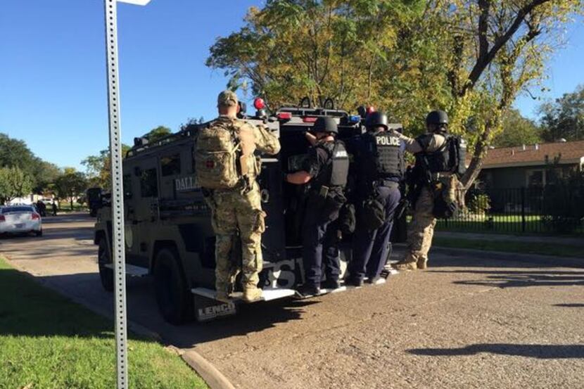 SWAT officers were later dispatched to the neighborhood on Wilbur Street.