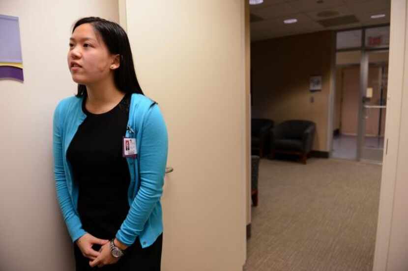 
Ashley Nguyen, a senior at Frisco Liberty High School, waits for Dr. Kristine Guleserian,...