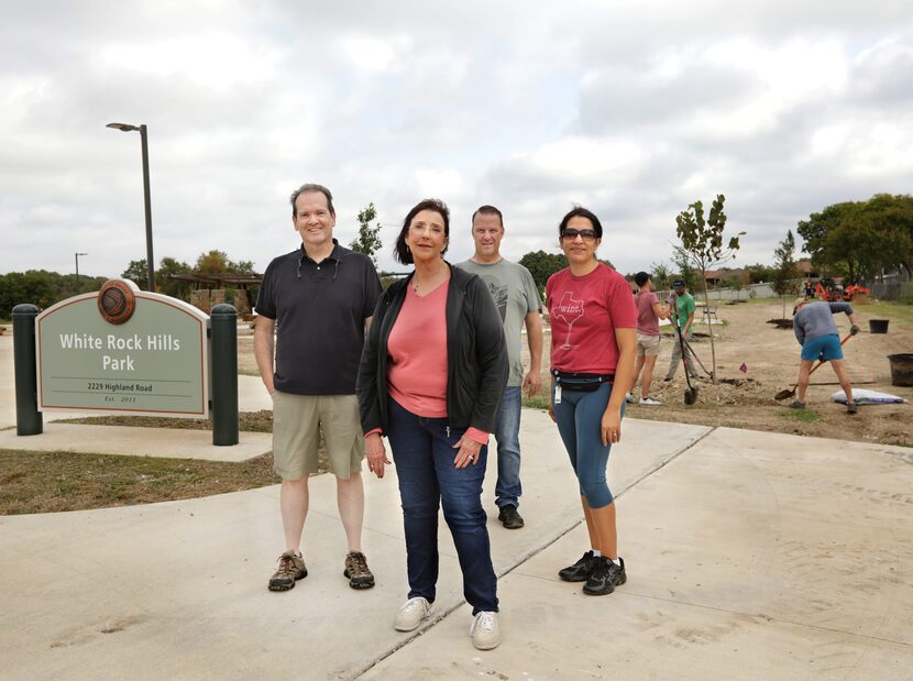 From left: Dan Ortman, Ferguson Road Initiative executive director Vikki Martin, park board...