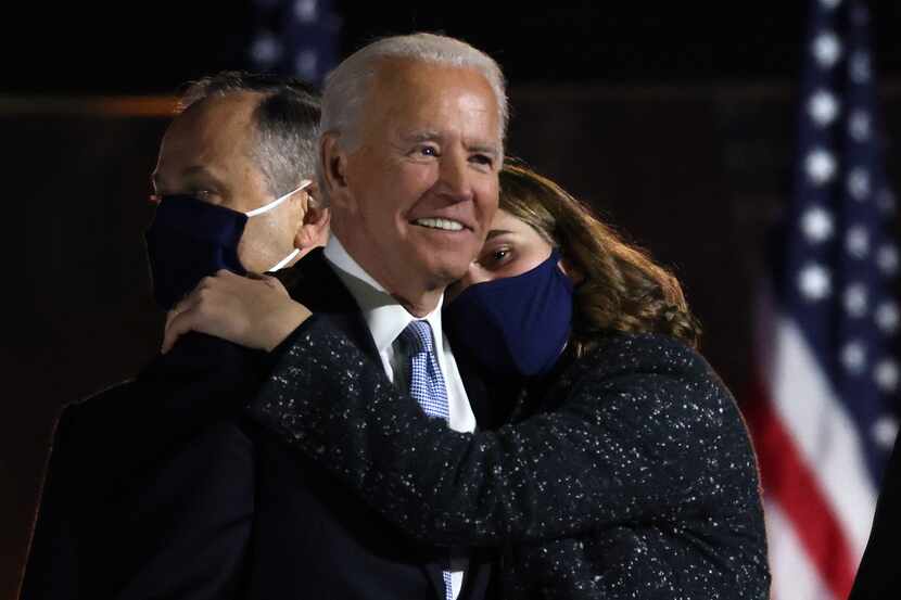 President-elect Joe Biden gets a hug from his granddaughter after delivering his victory...