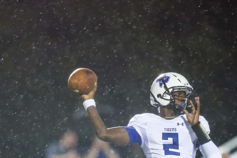 Trinity Christian quarterback Shedeur Sanders (2) fires off a pass during a matchup between...