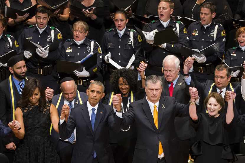First Lady Michelle Obama, President Barack Obama, Mayor Mike Rawlings and his wife, Micki,...