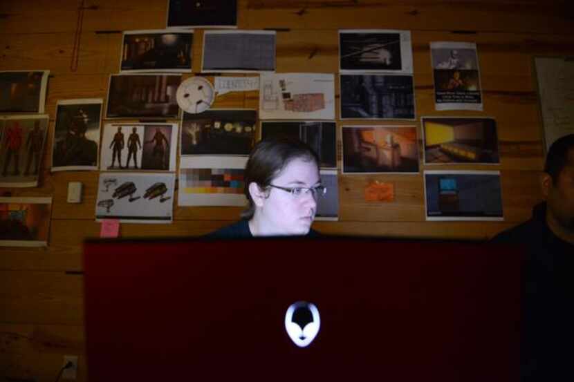 Morgan Wagnon, student at SMU’s graduate program for game development, works on a group...
