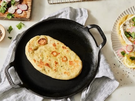 Tortilla on comal griddle