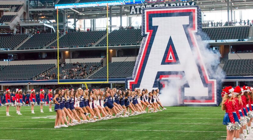 The Allen cheerleaders set the tone for the Eaglesâ entrance on the field.