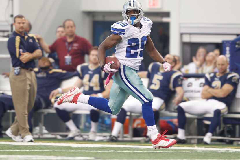 DeMarco Murray runs in the open field on the way to a long touchdown score during the first...