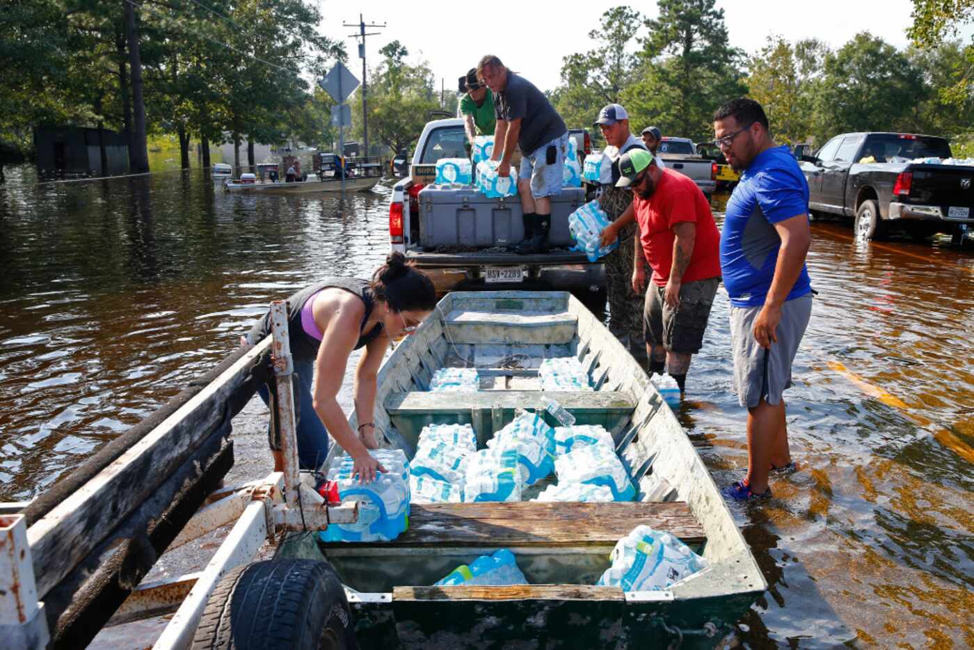 Volunteers load up boats to resupply Pine  Forest after Hurricane Harvey near Vidor, Texas,...