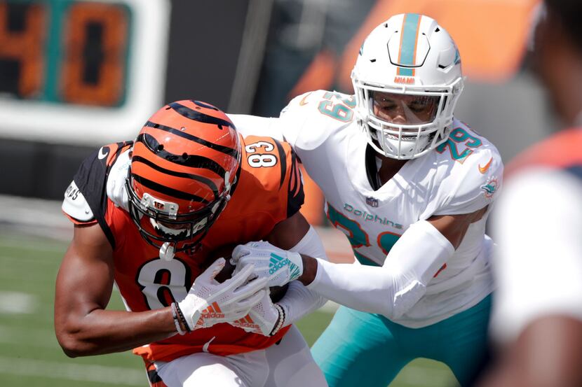 FILE - In this Oct. 7, 2018, file photo, Miami Dolphins' Minkah Fitzpatrick (29) tackles...