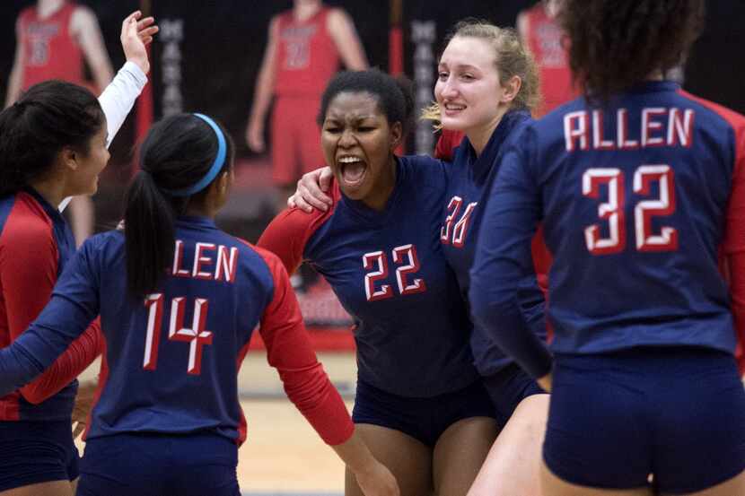Allen senior outside hitter Chandler Atwood (22) celebrates with her team after a point...