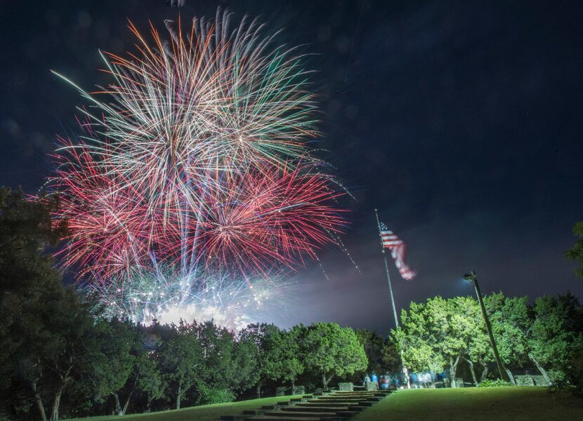 Fireworks explode over Flag Pole Hill earlier this summer.