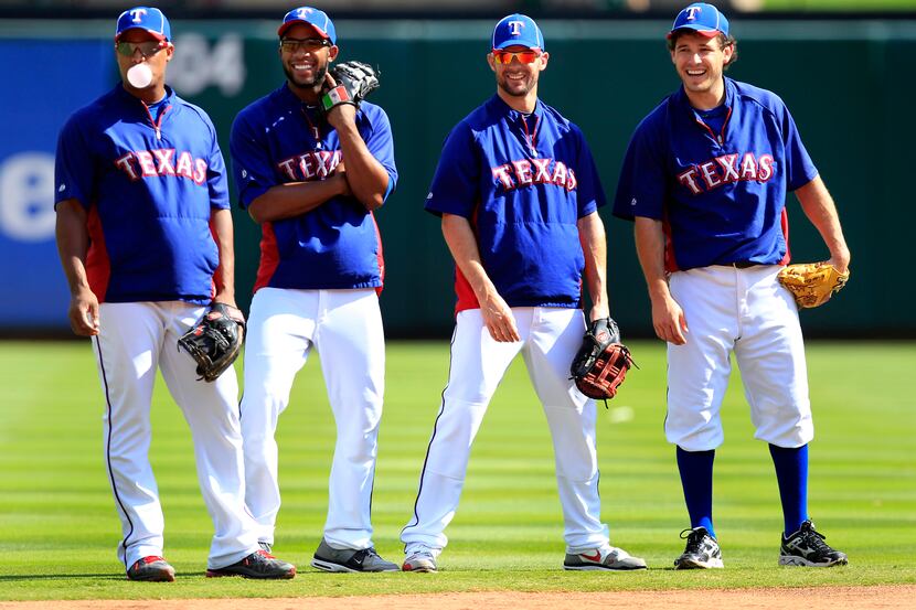 Texas Rangers players (L-R) Adrian Beltre, Elvis Andrus, Michael Young and Ian Kinsler...