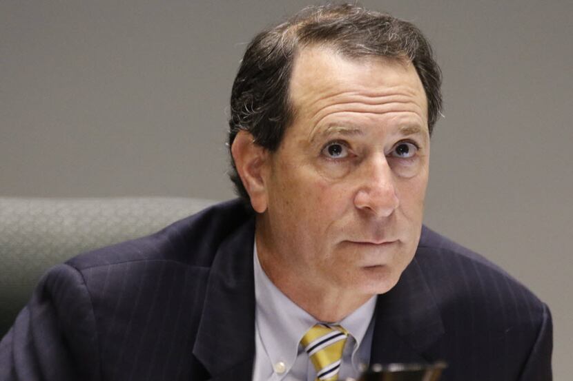 Dallas City Councilmember Lee M. Kleinman takes part in the council meeting on Tuesday,...